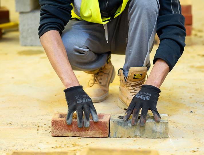student learning brick work 